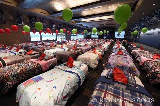 Various Events from the Hope to Dream Program have provided over 50,000 beds donated to children in need. Photo courtesy of  Miami Dolphins and Indianapolis Colts.